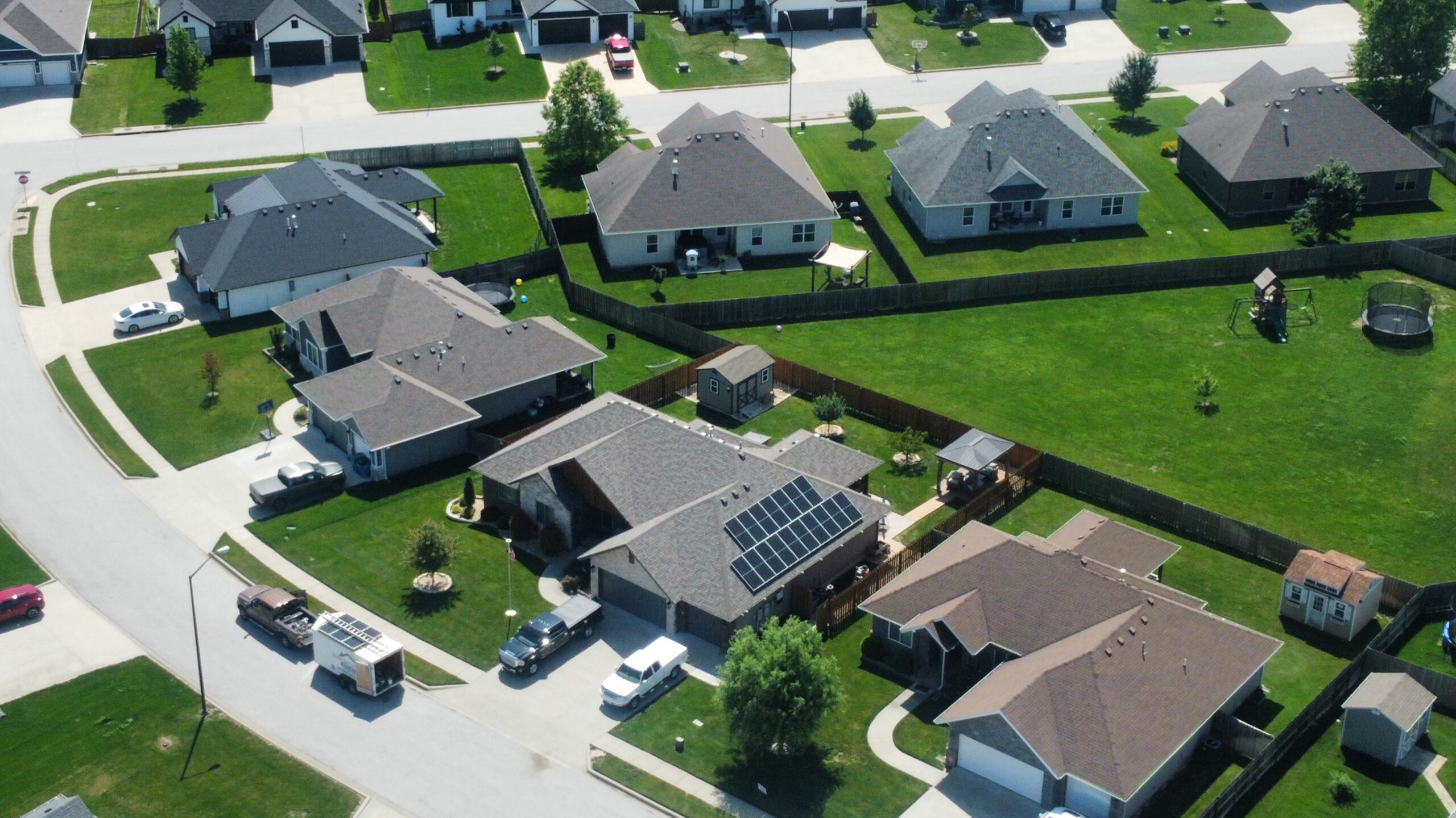 Aerial view of solar panel installation on a residential roof by Bliss Brothers Solar